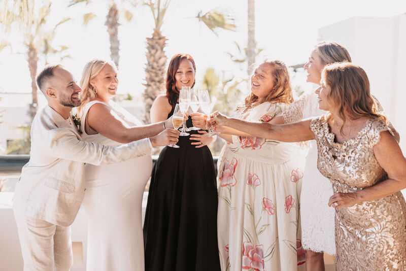 The bride and the Maids of Honor making a toast