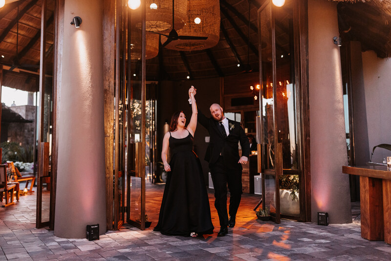 Brigitta and Michael arriving to their wedding reception