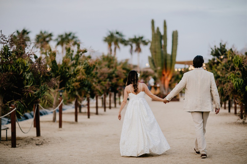 The couple walking around La Huerta Wedding Venue