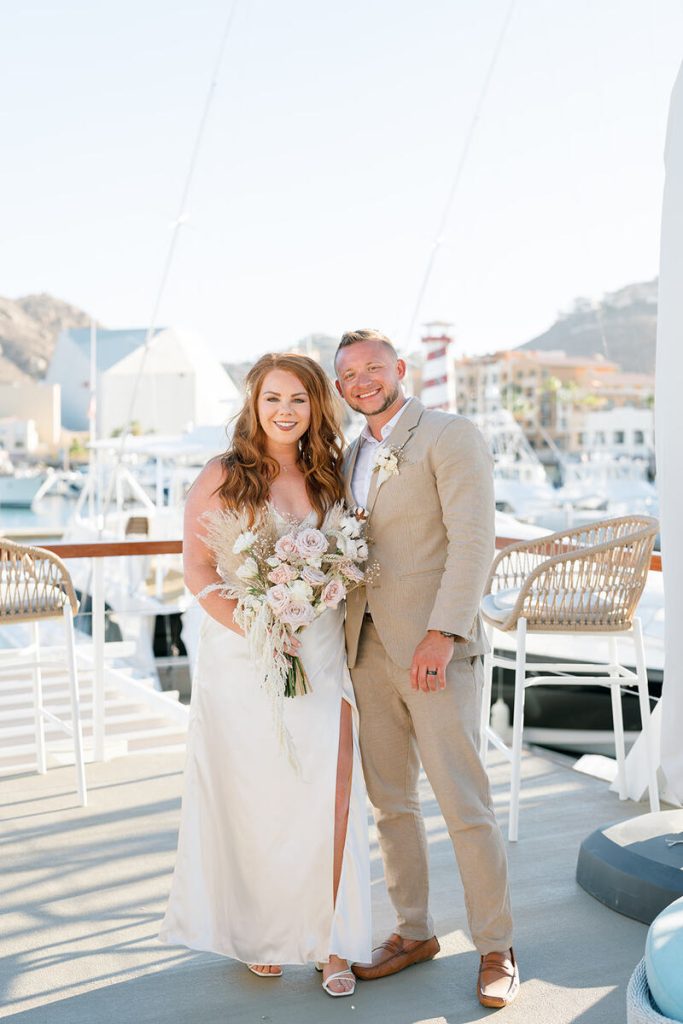 Kayla and Mark standing at the Cabo San Lucas Dock