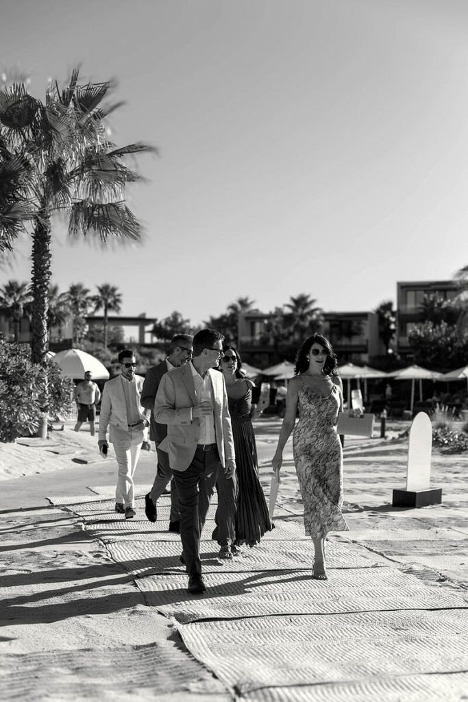 Guests heading to post ceremony cocktail