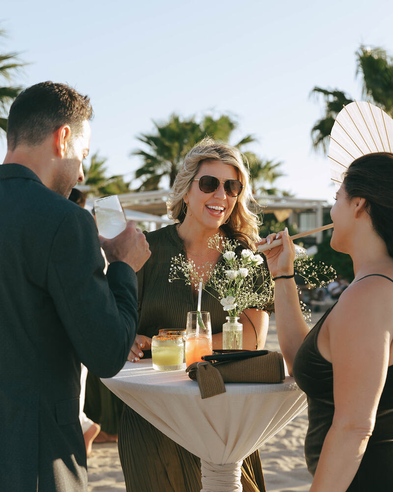Guests enjoying post ceremony cocktail