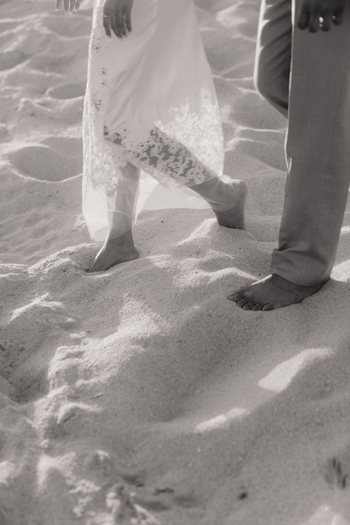 Couple walking on the beach for Wedding Proposal in Los Cabos