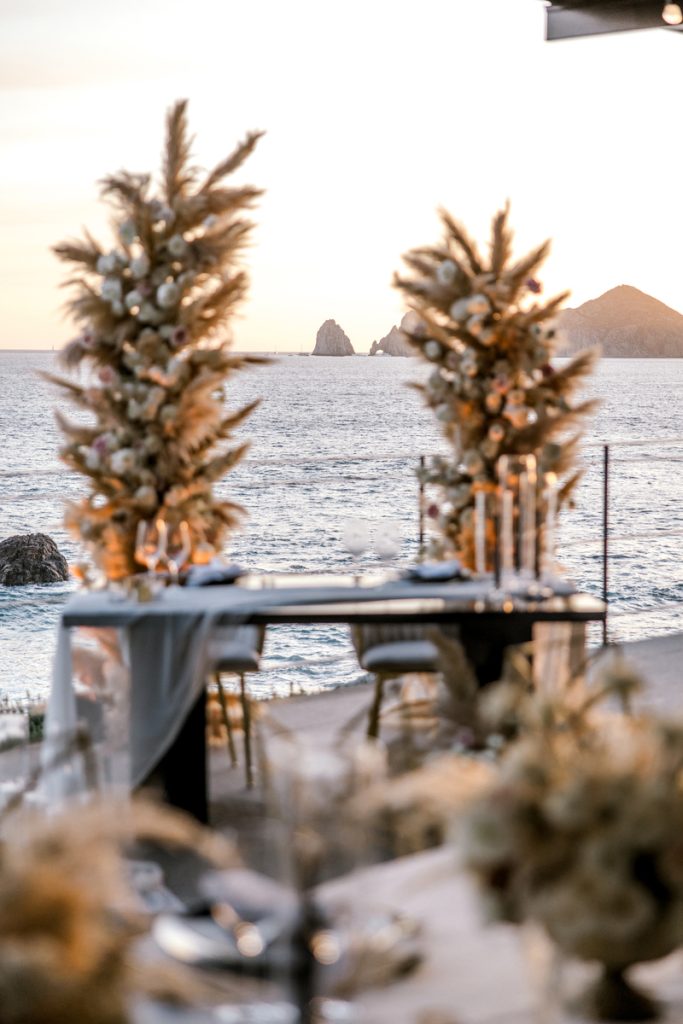 The Bride and Groom's table with wedding arch