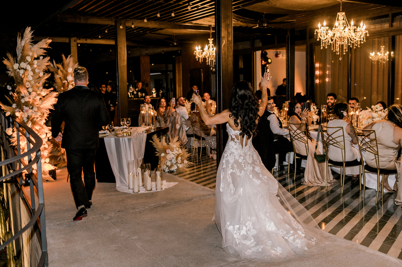 The newly weds making their entrance at their reception party