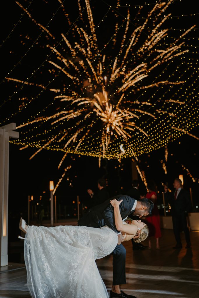 Fireworks start as the newly Weds dance