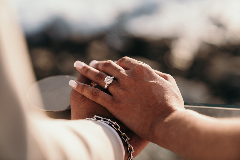 Close up of Nitra's hand Wearing engagement ring