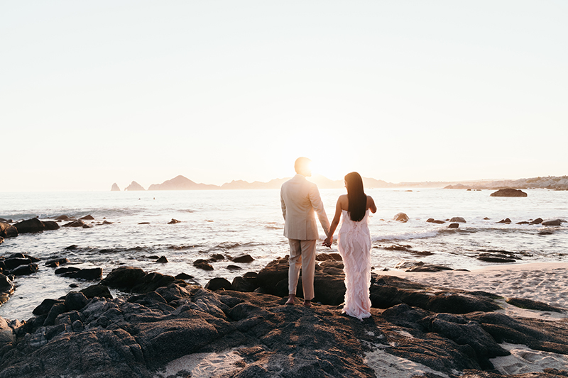 The couple starring at the sea