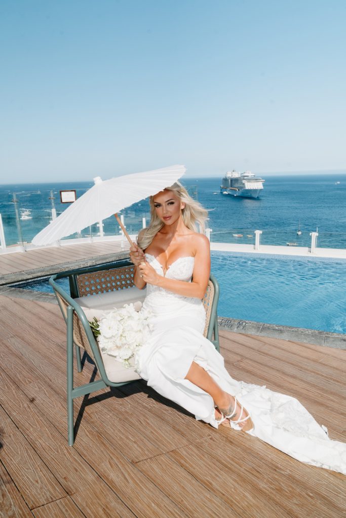 The Bride Holding an Umbrella