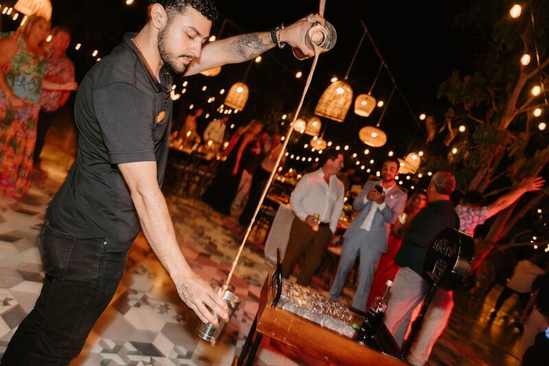 The barman fixing drinks