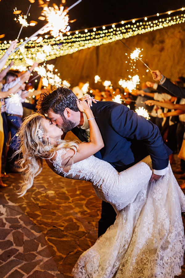 Couple Kissing at Cabo Wedding Reception