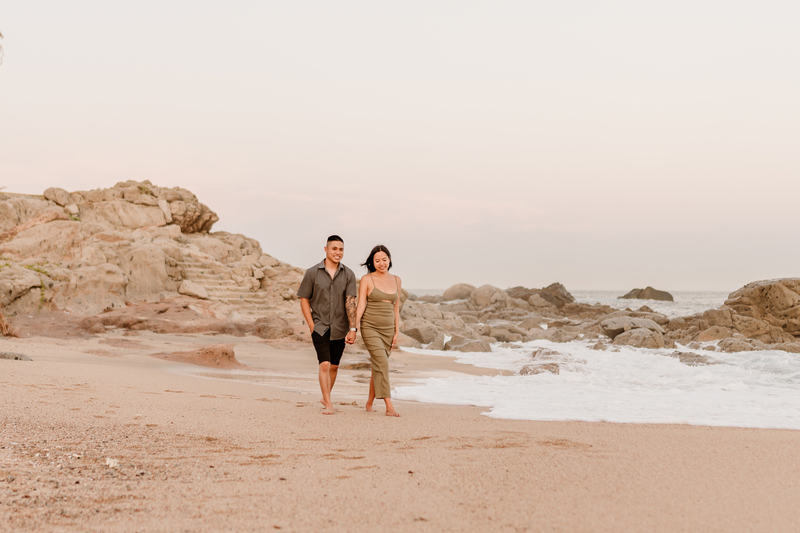 Casey and Kevin walking on the beach