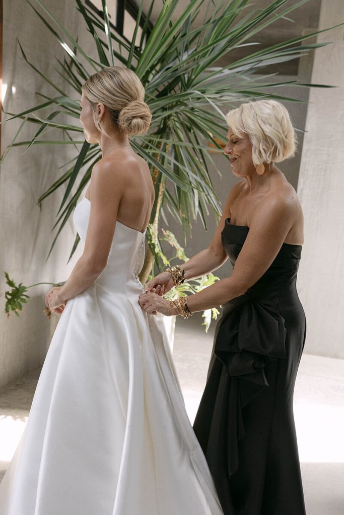 Bella's Mother Helping her Dress Up for Wedding
