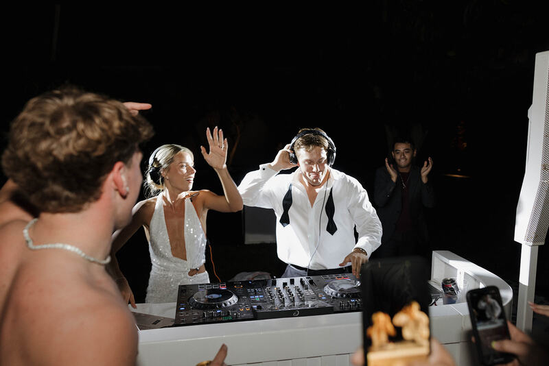 The newly weds DJing
