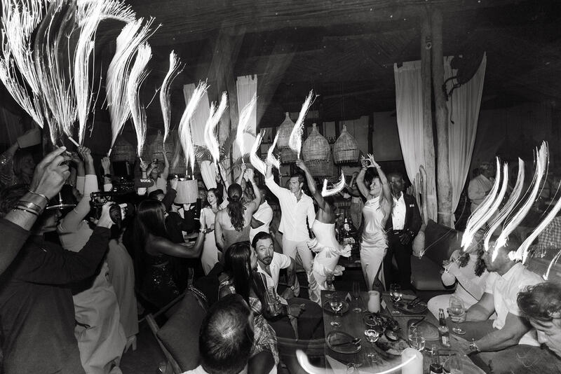 Guests enjoying the party at Chambao