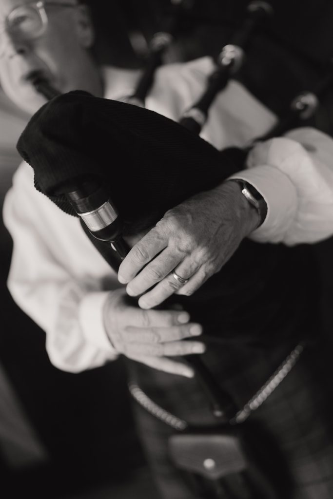 Musician playing pipebag for wedding ceremony