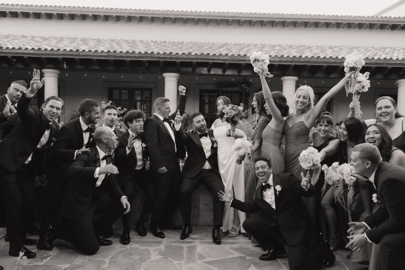 The newly weds with their bestmen and bridesmaids